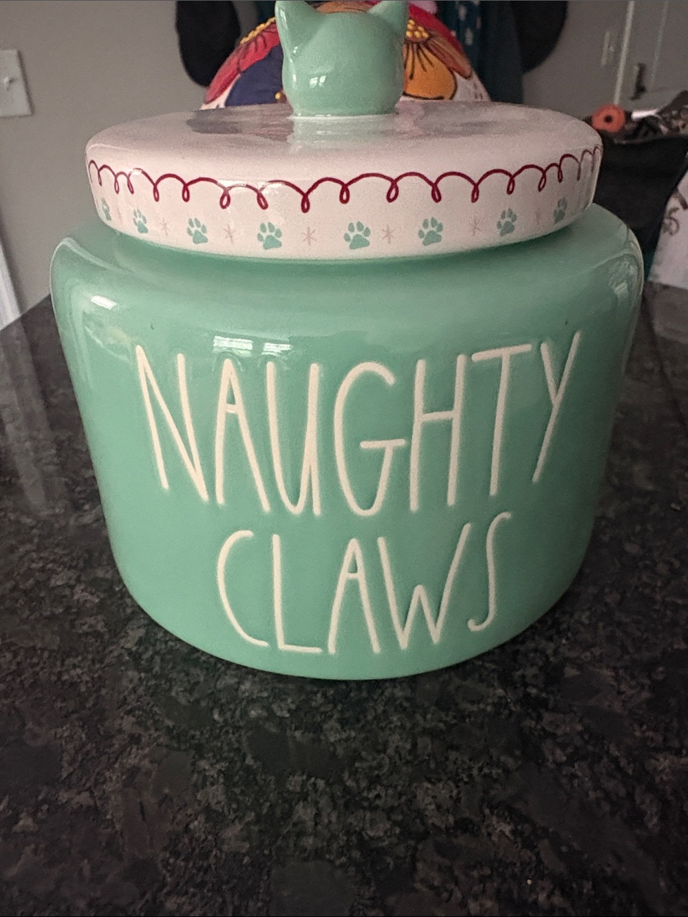 Rae Dunn mint green "Naughty Claws" ceramic jar with paw-print lid